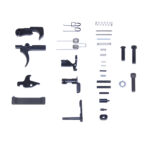 AR-15 rifle parts kit: trigger, springs, pins, bolts neatly laid out.