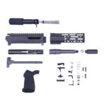 Disassembled AR-15 rifle parts including barrel, receiver, handguard, bolt carrier group, and accessories.