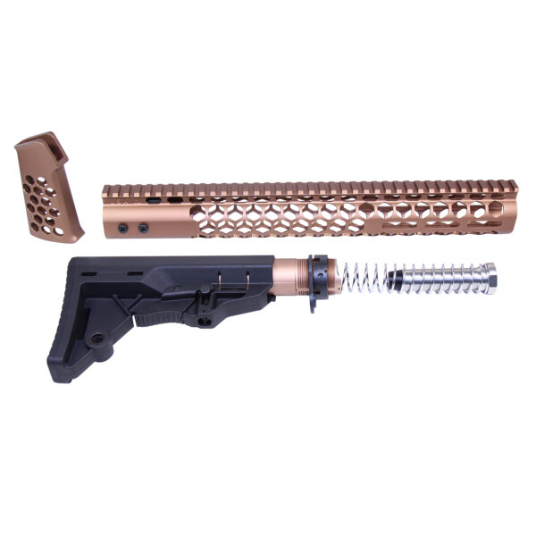 Disassembled AR-style rifle parts in copper and black with intricate designs.