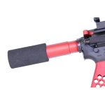Close-up of airsoft gun with red barrel extension and black mock suppressor.