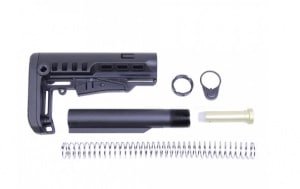 Disassembled AR-15 adjustable buttstock kit with buffer spring, tube, and retainer for tactical customization.