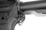 Close-up of AR-15 rifle sling attachment and receiver, showcasing precision engineering and design.