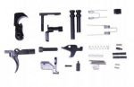 Disassembled AR-308 lower parts kit layout on white background.