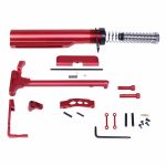 AR-15 red anodized buffer tube and accessory kit on white background.
