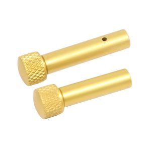 Anodized gold AR 5.56 Cal extended takedown pin set against a white background.