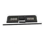 Black .308 Winchester dust cover for AR rifles with hinge and spring assembly.