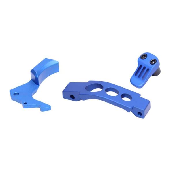 Blue anodized AR-15 accessories: trigger guard, grip or magazine release, and compensator.
