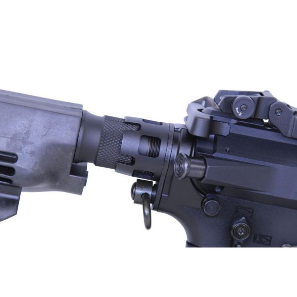 Close-up of AR-15 buffer tube and stock, featuring tactical mount and precision engineering.
