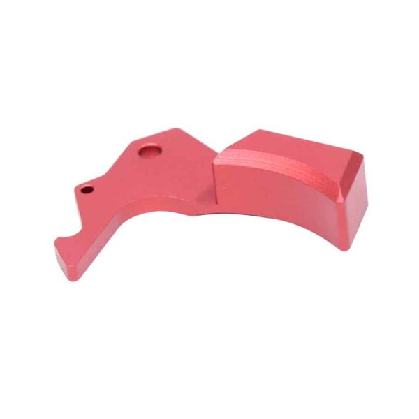 Anodized red ergonomic AR-15 charging handle latch, precision-machined with mounting holes.