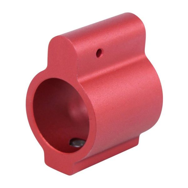 Anodized red aluminum AR-15 gas block with precise cylindrical bore and smooth finish.