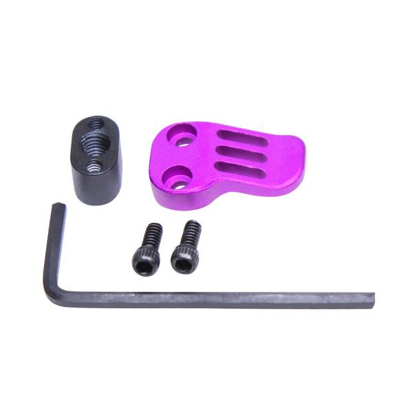 Anodized purple AR-15 extended mag release kit with ergonomic design and installation tools.