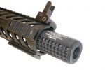 Close-up of AR-15 rifle with perforated dark gray fake suppressor attached.