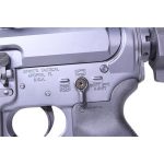 Close-up of Spikes Tactical AR-15 receiver showing selector switch and manufacturer markings.