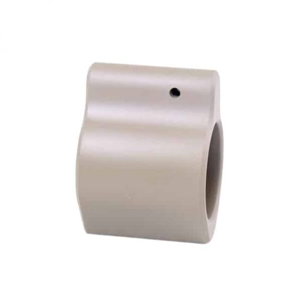 Precision-machined AR-15 gas block with silver finish and horizontal marks, hollow center.