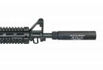 Close-up of tactical AR-15 with suppressor and quad rail on a white background.