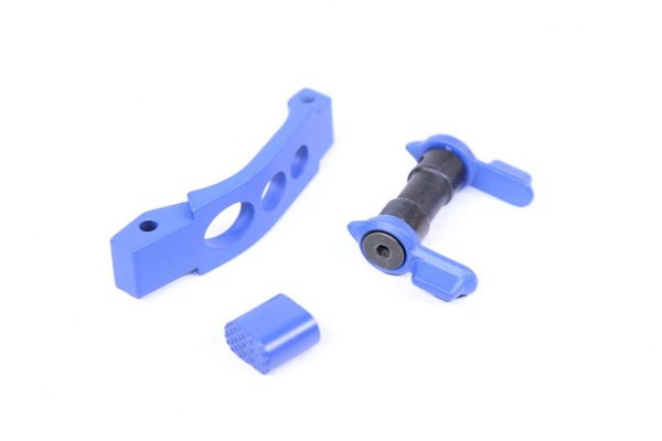 Bright blue AR-15 upgrade parts: trigger guard, firing component, and control piece.