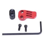 Red anodized AR-15 extended magazine release kit with components and installation tool.