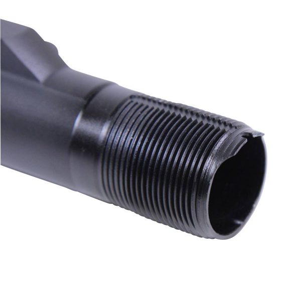 Close-up of a black firearm barrels precision-threaded section for accessory attachment.