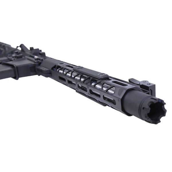 Close-up of matte black tactical firearm barrel and modular handguard with M-LOK rail slots.