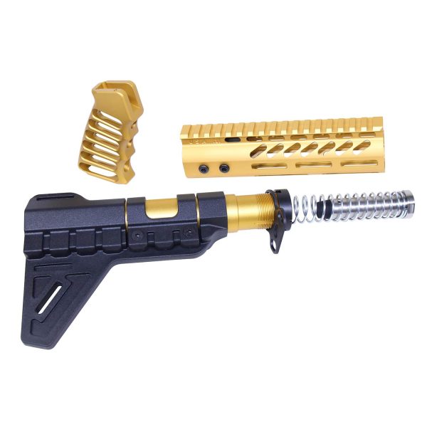 Gold AR-15 pistol furniture set with tactical stock, handguard, and grip.