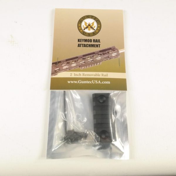 Guntec USA 2-inch KeyMod accessory rail in anodized black packaging.
