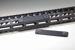 M-LOK black rail section with neoprene grip panels by Guntec USA.