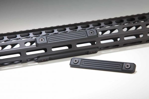 M-LOK black rail section with neoprene grip panels by Guntec USA.