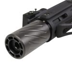 Spiral fluted muzzle brake on firearm barrel, reduces recoil and enhances performance.