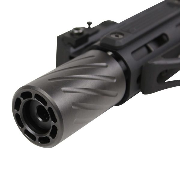 Spiral fluted muzzle brake on firearm barrel, reduces recoil and enhances performance.