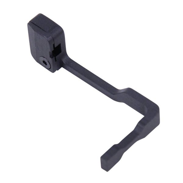 Matte black AR-15 bolt catch release attachment with angular, robust design for enhanced firearm control.