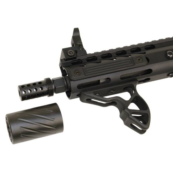 Close-up of modular black tactical rifle with rail system and detachable muzzle device.