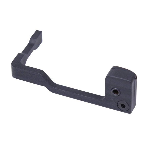 Modern firearm trigger guard, black anodized, angular design, two mounting holes, ergonomic.