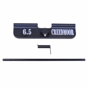 6.5 Creedmoor AR-10 dust cover and assembly components on white.