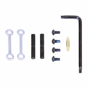 AR-15 anti-rotation pin set with tools on white background.