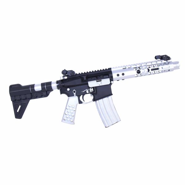 Black and white rifle with realistic design and tactical features.