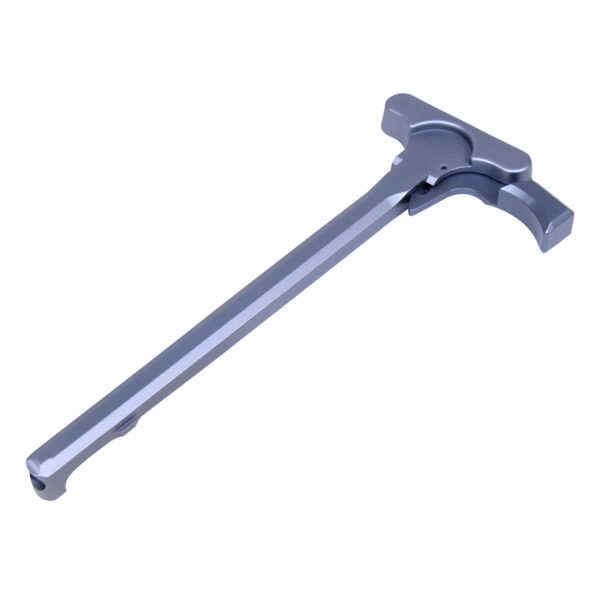 Enhanced AR-15 charging handle with oversized ambidextrous latch, aluminum build, bluish-gray finish.