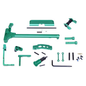 Collection of precision-engineered green metallic components and assembly tools on white background.