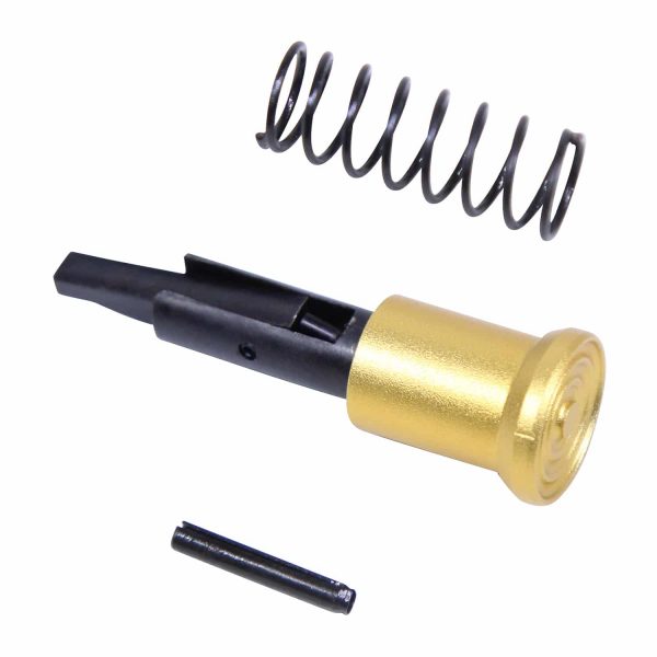 AR-15 forward assist assembly parts in anodized gold finish.