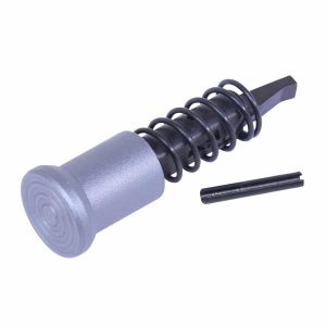 Grey AR-15 forward assist assembly with coiled spring and locking pin.