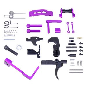 AR-15 lower parts kit in purple anodized finish, neatly organized for assembly.