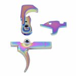 Rainbow PVD-coated AR-15 trigger assembly parts on white background.