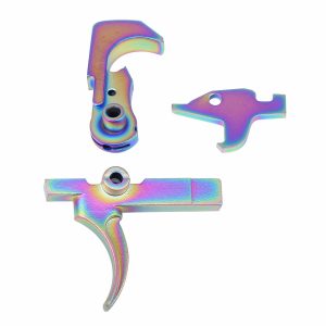 Rainbow PVD-coated AR-15 trigger assembly parts on white background.