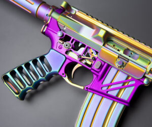 Custom AR-style rifle with colorful iridescent finish and ergonomic grip.