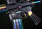 Close-up of AR pistol with RPVD iridescent finish and custom emblem.