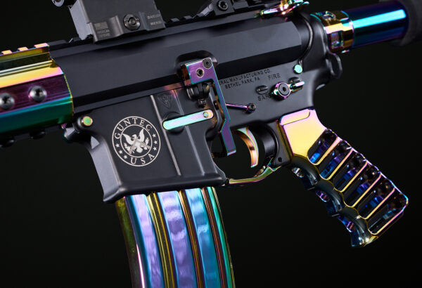Close-up of AR pistol with RPVD iridescent finish and custom emblem.