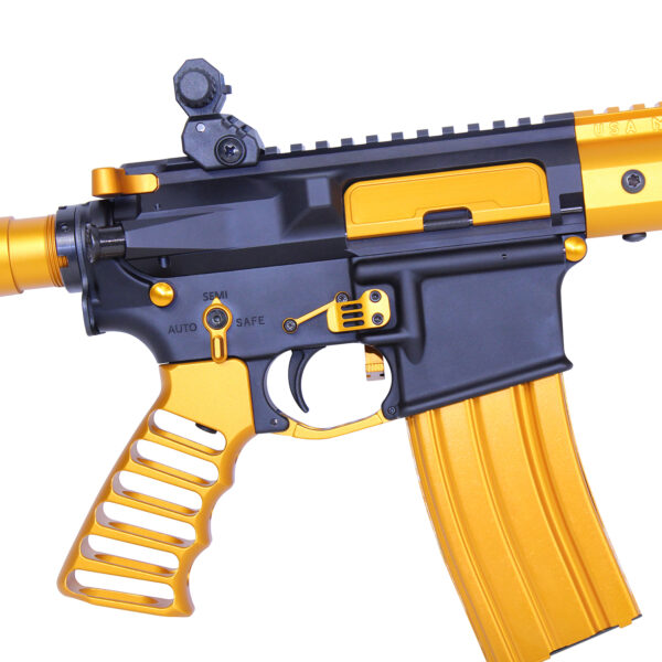 Custom black and gold firearm with skeletal grip and detailed receiver.
