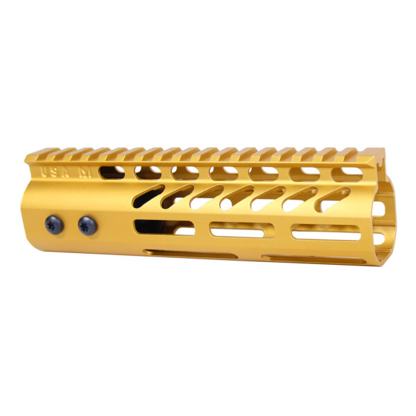 Gold aluminum rifle handguard with Picatinny rail and ventilation cutouts.