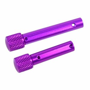 Anodized purple AR .308 extended takedown pins with textured grip and alignment holes.