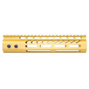 Gold anodized 9-inch Guntec M-LOK AR-15 handguard with monolithic top rail.