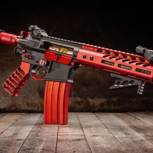 Custom AR-15 rifle with red and black anodized upper receiver kit.